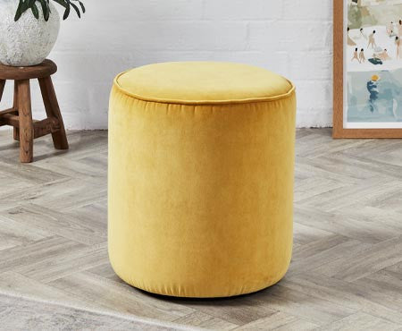 Why a Pouffe or Black Ottoman Is A Home’s Next Statement Piece
