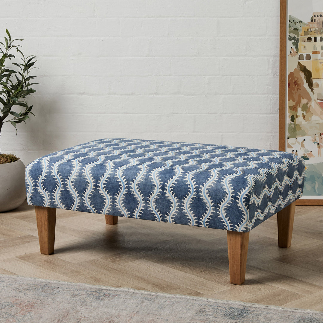 Does a Leather Footstool or Fabric Footstool Survive Pets?