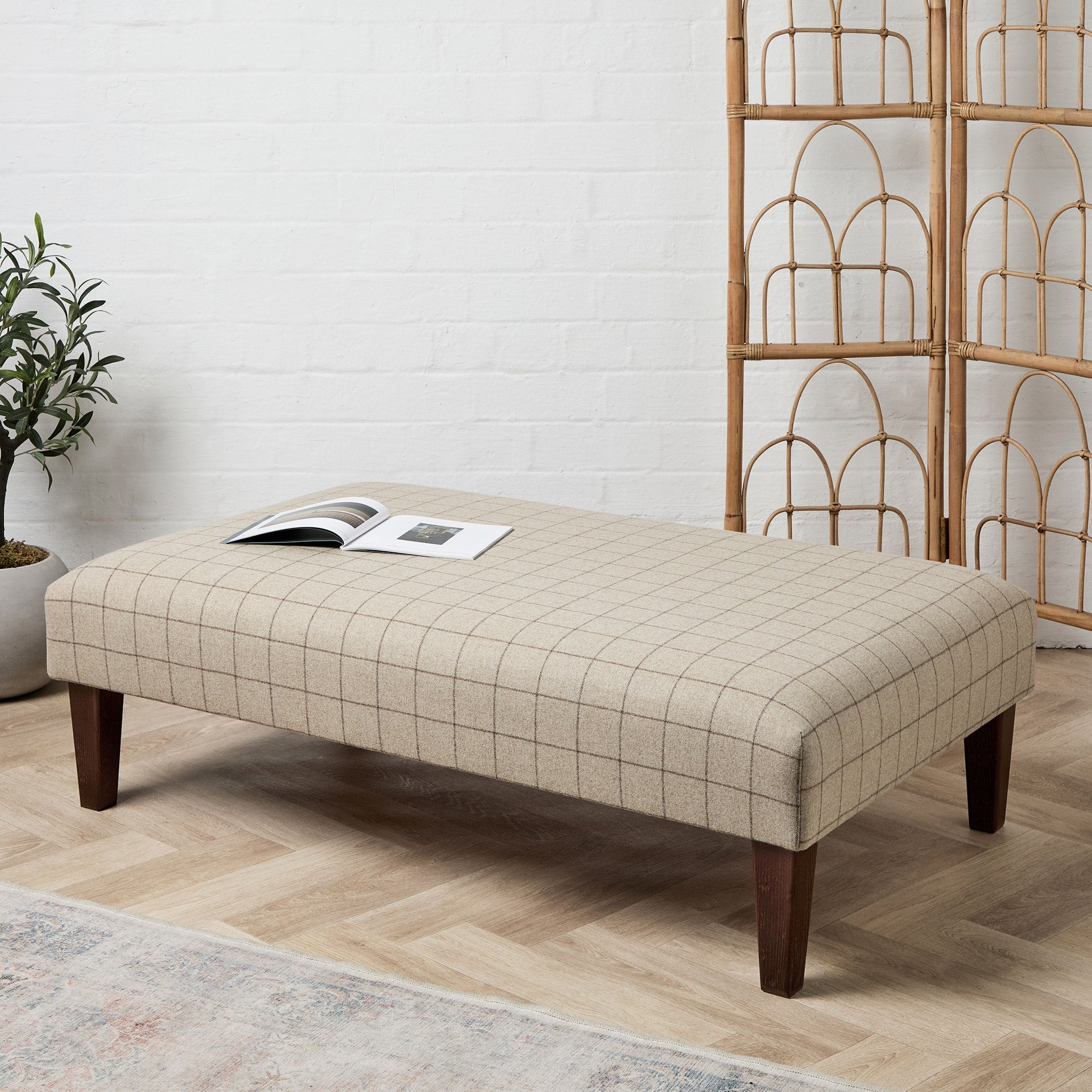 Using a Large Ottoman as a Coffee Table (Done Right)